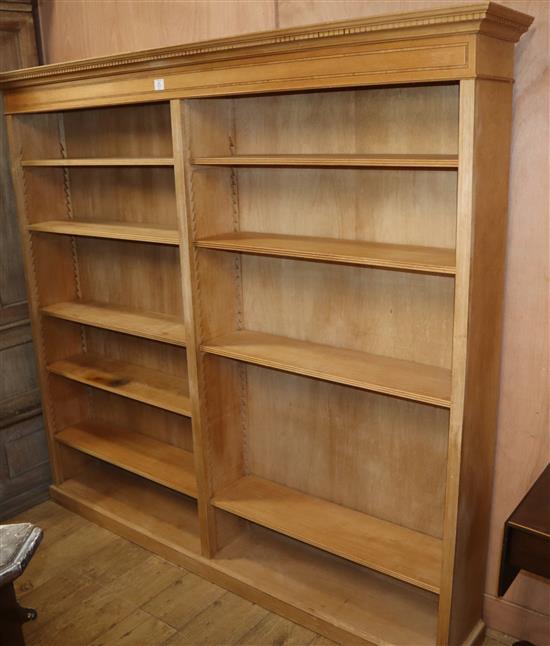 A large bleached mahogany open bookcase W.197cm